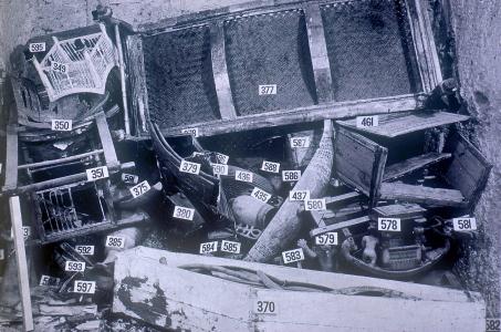King Tutankhamen's funerary equipment surmounted by the wooden day-bed, no.377.